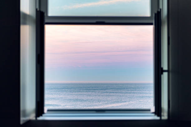 istock Sunrise over Atlantic Ocean through the open window 1373929124