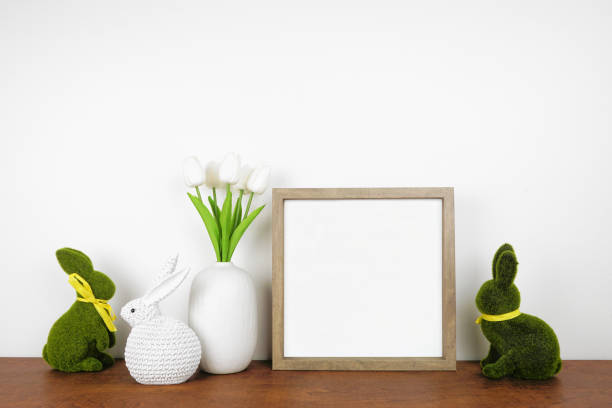 istock Mock up wood frame with Easter decor on a wood shelf 1373944502