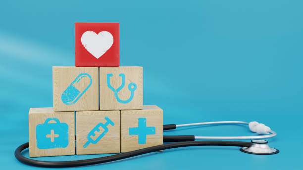 3D Render Wooden Blocks with Healthcare Icons and Stethoscope red heart stock photo