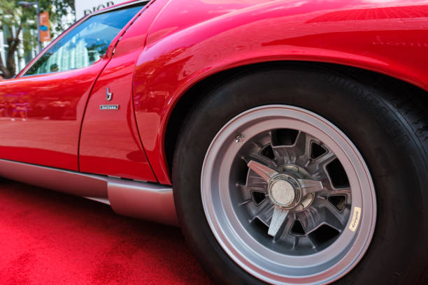 Vintage Lamborghini Miura Sports Car Miami, Florida USA - February 20, 2022: Vintage 1971 Lamborghini Miura SV sports car on display at the public Miami Concours car show in the upscale Design District. lamborghini miura stock pictures, royalty-free photos & images