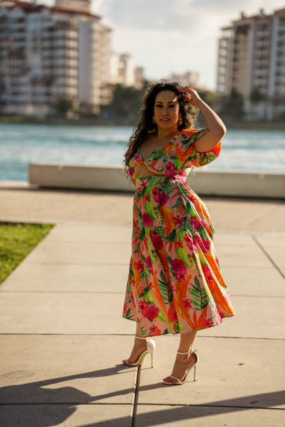 istock Attractive young fashion model posing outdoors in natural lighting 1374062463
