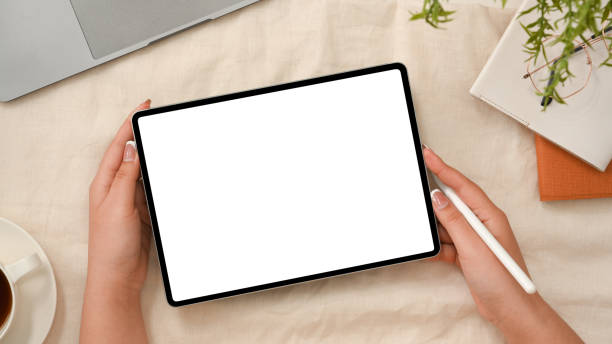 istock Top view, Woman working digital tablet touchpad 1374117056