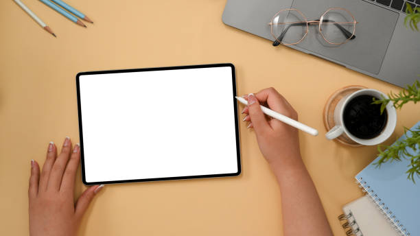 istock Female graphic designer sketching on tablet 1374117585
