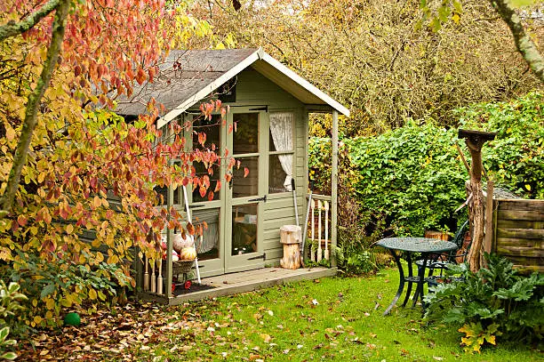 Autumn leaves are  falling in the gardenand and the summerhouse is closed up for another year