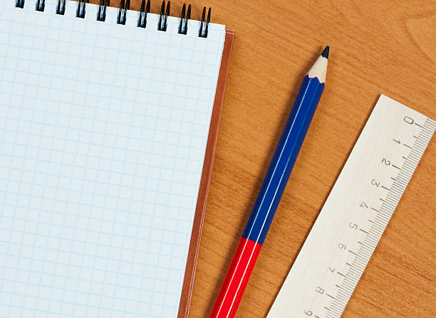 istock Pad, wooden ruler and pencil on table. 137416807