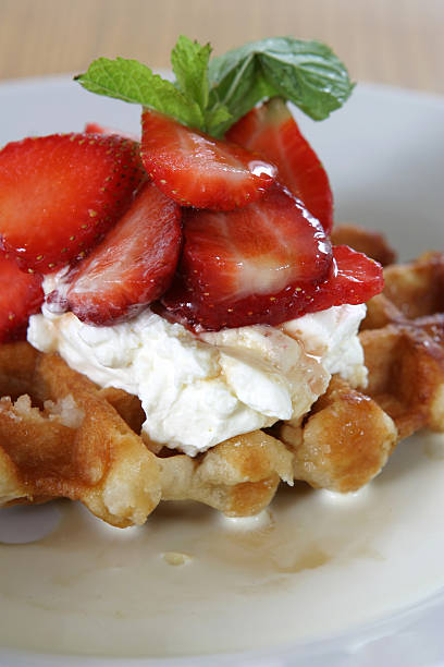 istock Fresh strawberries and cream on waffles 137417248