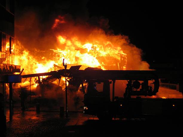 istock Firetruck infront of burning house 137420651