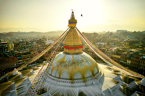 Bouddha (Nepali: बौद्धनाथ; Nepal bhasa: खास्ति चैत्य; Standard Tibetan: བྱ་རུང་ཁ་ཤོར།, romanized: Jarung Khashor, Wylie: bya rung kha shor), also known as Boudhanath, Khasti Chaitya and Khāsa Chaitya is a stupa in Kathmandu, Nepal. Located about 11 km (6.8 mi) from the center and northeastern outskirts of Kathmandu, its massive mandala makes it one of the largest spherical stupas in Nepal and the world.