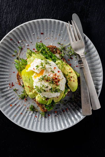 istock Asparagus with Avocado and a Poached Egg on Rye Bread 1374229428