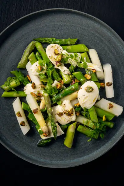 Photo of Mozzarella with White and Green Asparagus and Pistachios