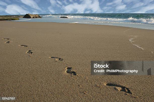Footsteps On The Beach Stock Photo - Download Image Now - Beach, Breaking Wave, Cloud - Sky