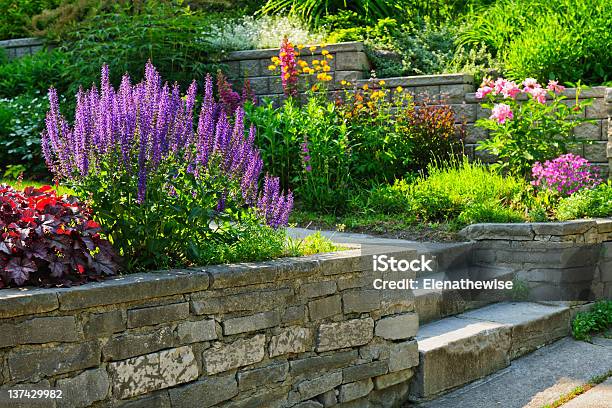 Garden With Stone Landscaping Stock Photo - Download Image Now - Yard - Grounds, Retaining Wall, Flower