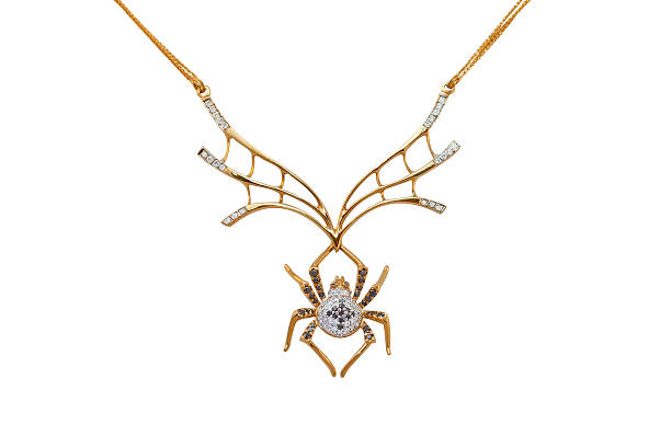 istock golden necklace with white and black diamonds 137430322