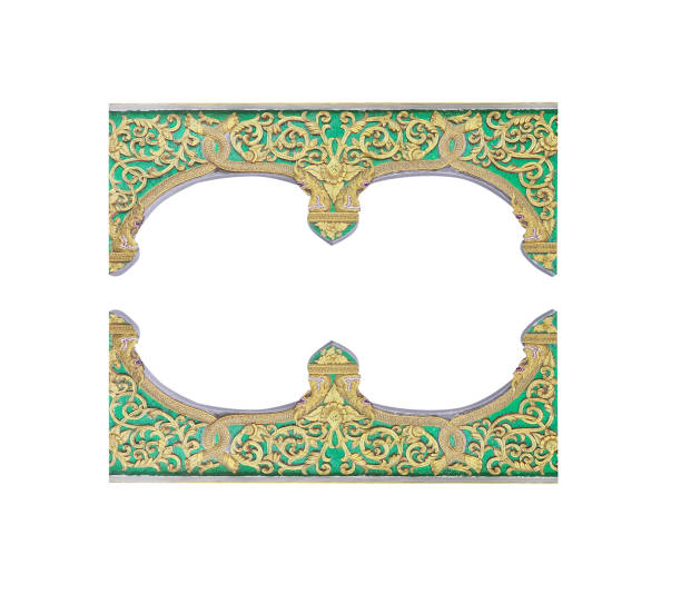 istock Gold engraving with flower and serpent patterns on wood frame  isolated on white background , clipping path 1374323910