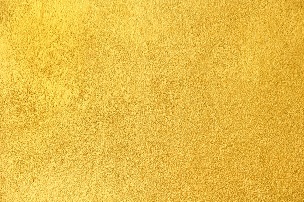 istock Gold paint cement wall texture with rough seamless patterns for colorful background 1374325059