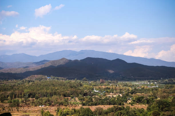 istock Mountain view lanscape on vast blue sky clouds,background in Mae Wang District in Chiang Mai of Thailand 1374325459
