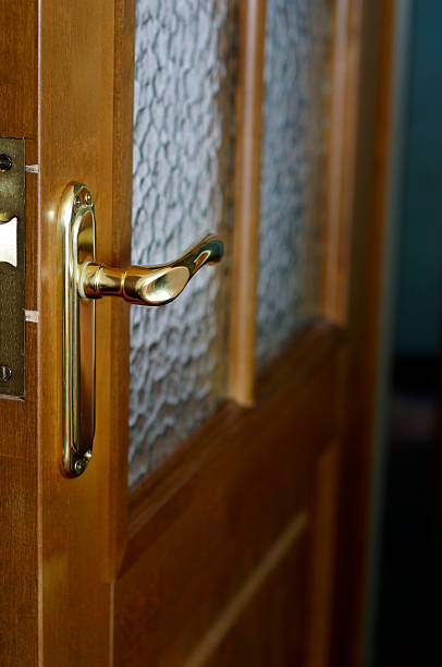 istock One metal, gold door handle 137433345