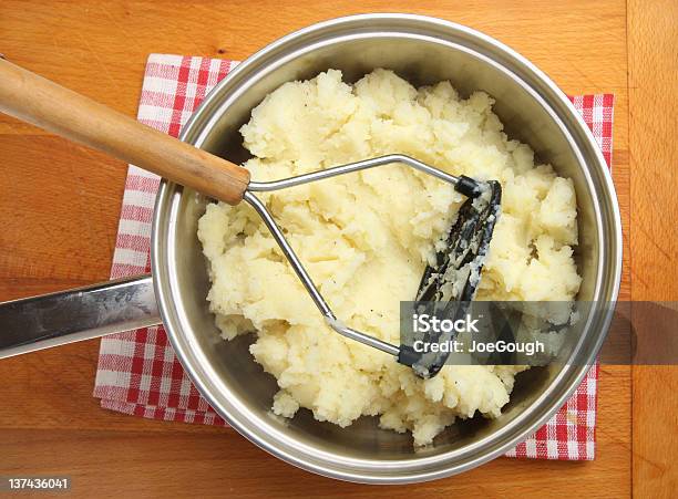 Making Mashed Potato Stock Photo - Download Image Now - Potato Masher, Prepared Potato, Vegetable