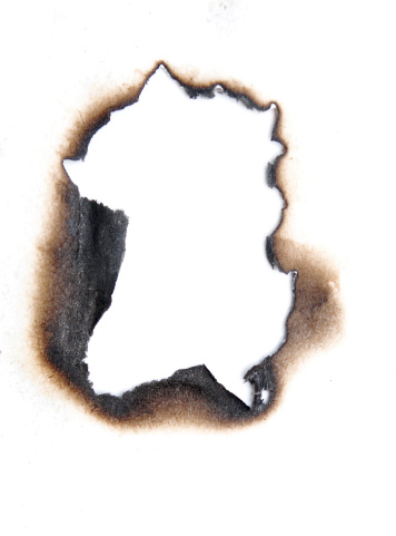 burnt hole in a paper