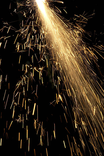 istock Orange sparks flying from cutting metal 137436882