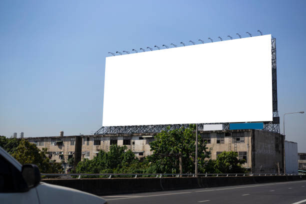 istock Billboard canvas mock up in city background 1374377775