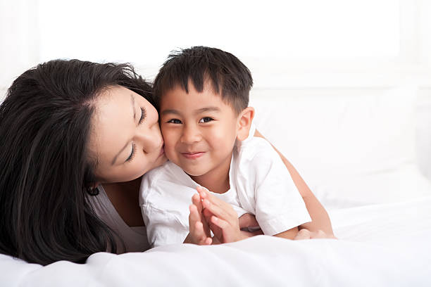 istock Mother and son bedroom portrait 137438234