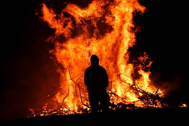 istock Man in Front of Bonfire 137439137