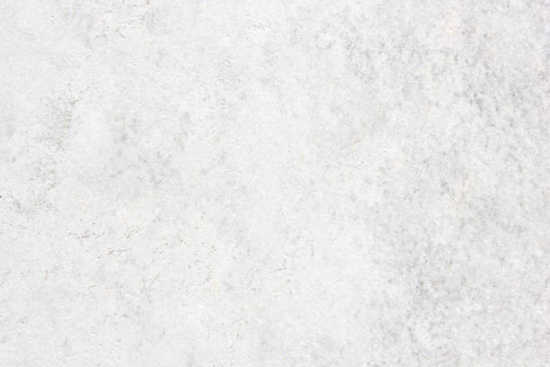 istock white background of natural cement or stone old texture as a retro pattern wall. It is a concept, Loft style design ideas living home. 1374395548