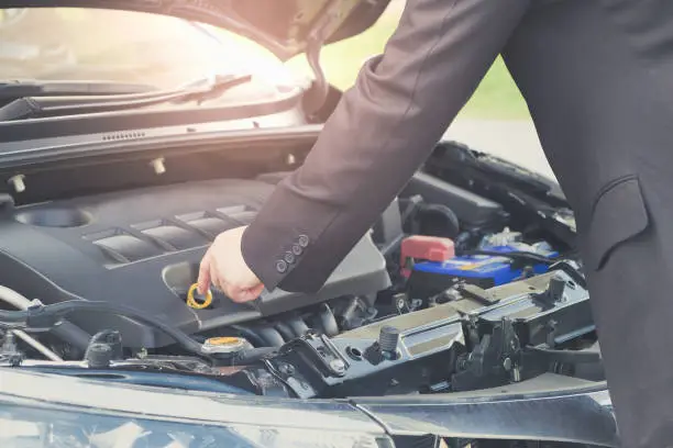 Photo of Finding the way to fix his broken down car