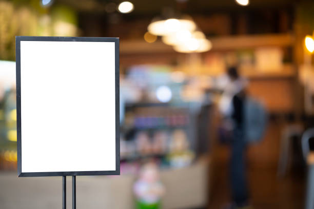 istock mockup white poster with black frame stand in front of blur restaurant cafe background 1374400174