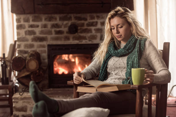 istock Enjoying in warm tea and a book 1374404552