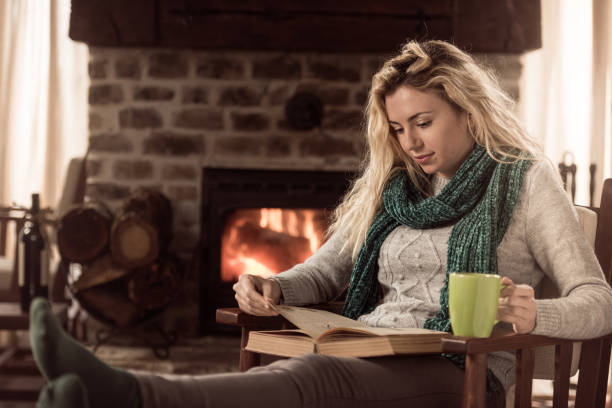 istock Enjoying in warm tea and a book 1374406069