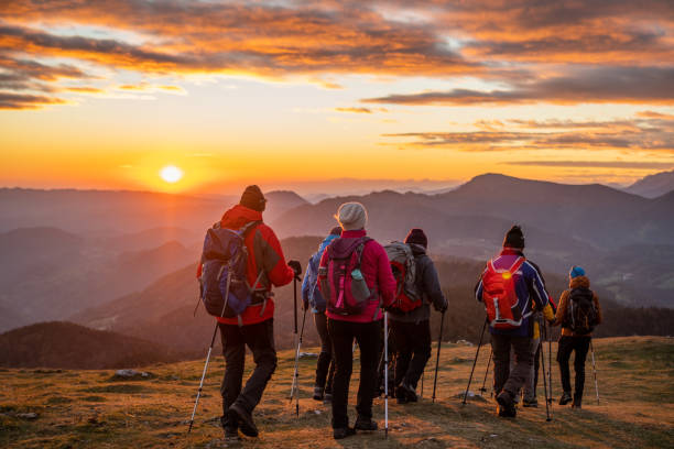 istock Group of hikers walking on mountain 1374414829
