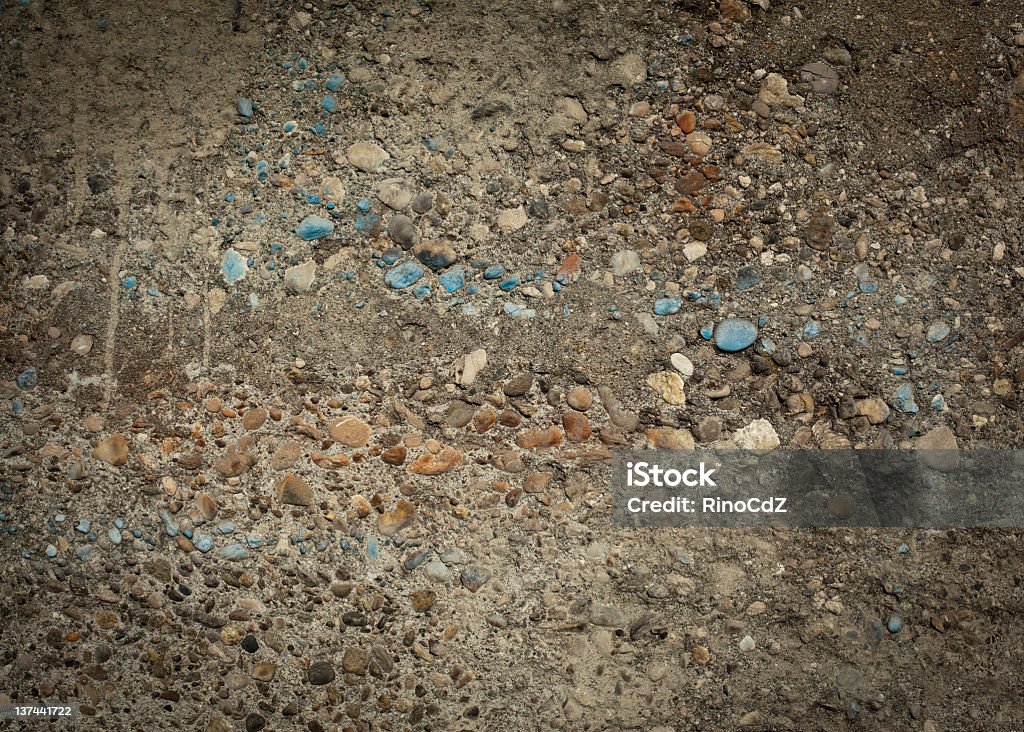 Small Painted Stones Wall Texture Pattern Background Stones and cement Wall Texture Pattern Background Building Exterior Stock Photo