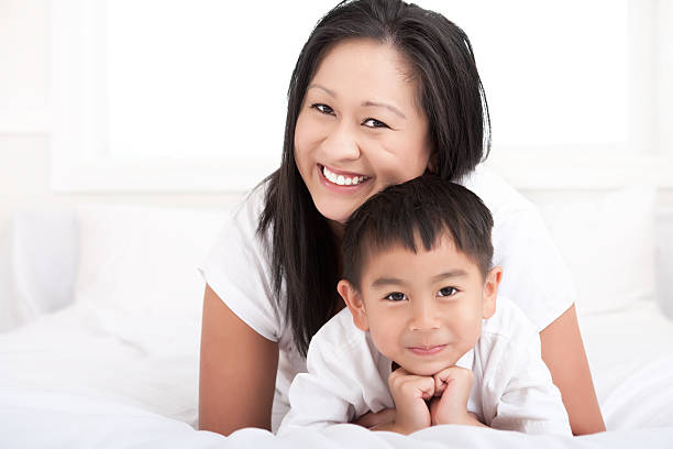 istock Mother and son bedroom portrait 137442263