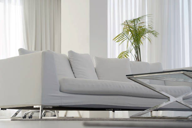 istock Beautiful white sofa in living room 1374451762