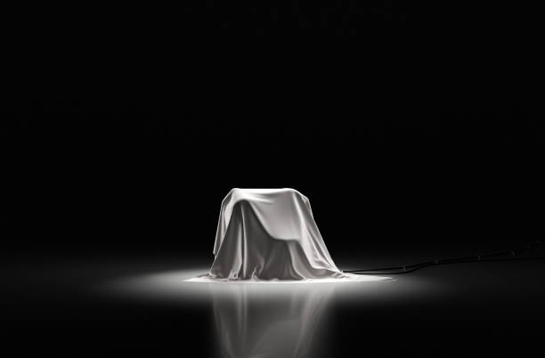 Revealing a new manufacturing robot Sheets covering a new manufacturing robot at a product launch even for industrial technology. kick off stock pictures, royalty-free photos & images