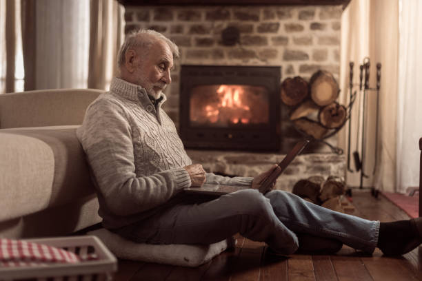 istock Senior man blogging! 1374469066