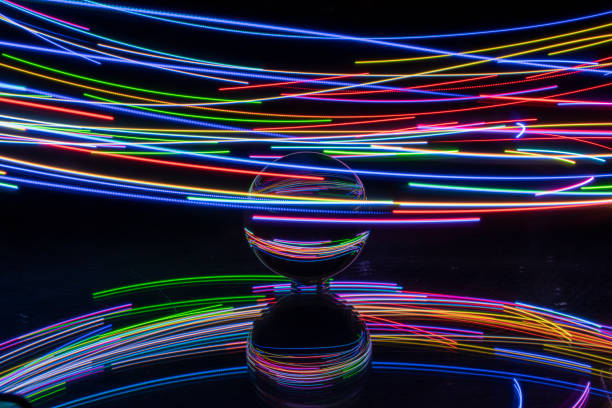 istock light painting with crystal ball, colored lights, light trails, abstract photos 1374470600