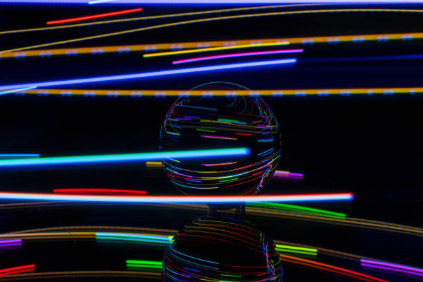 istock light painting with crystal ball, colored lights, light trails, abstract photos 1374470643