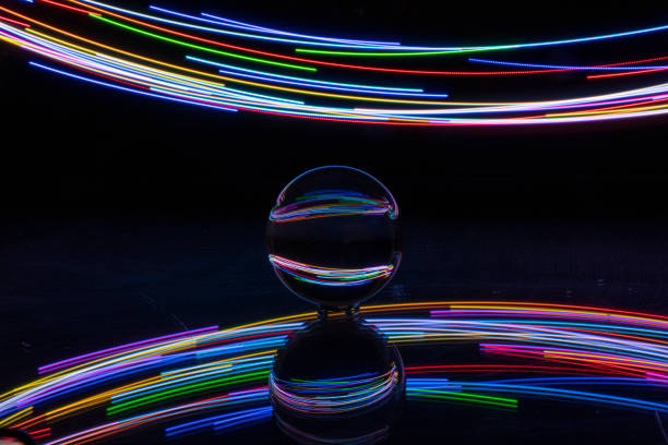 istock light painting with crystal ball, colored lights, light trails, abstract photos 1374470653