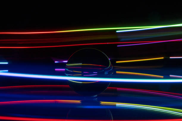 istock light painting with crystal ball, colored lights, light trails, abstract photos 1374470814