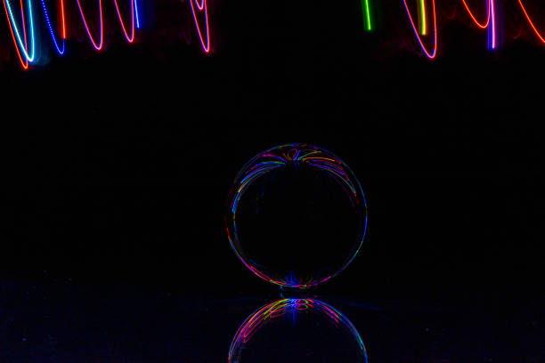 istock light painting with crystal ball, colored lights, light trails, abstract photos 1374470854