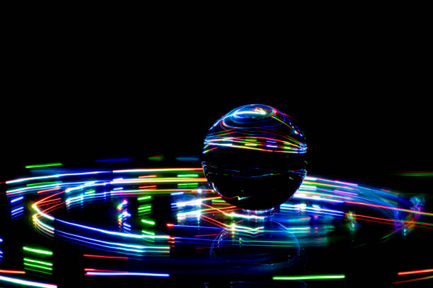 istock light painting with crystal ball, colored lights, light trails, abstract photos 1374470856