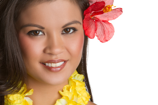 Hawaiian woman with hibiscus flower in hair
