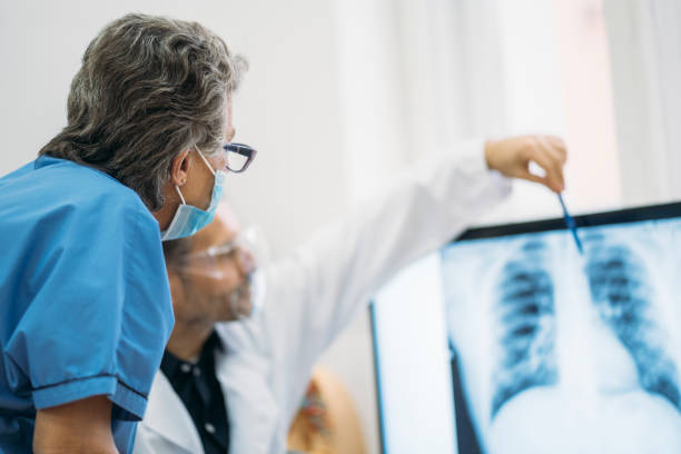 istock Discussing about patient's lungs during COVID-19 pandemic 1374476142