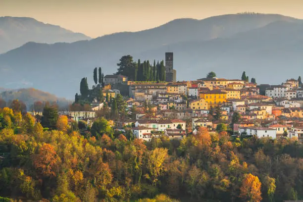 Barga medieval village at sunset in autumn. Garfagnana, Tuscany, Italy Europe