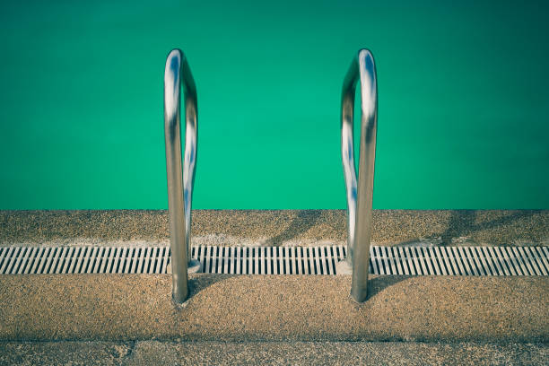 Starting blocks in swimming pool. This photo can be used for sport concept.