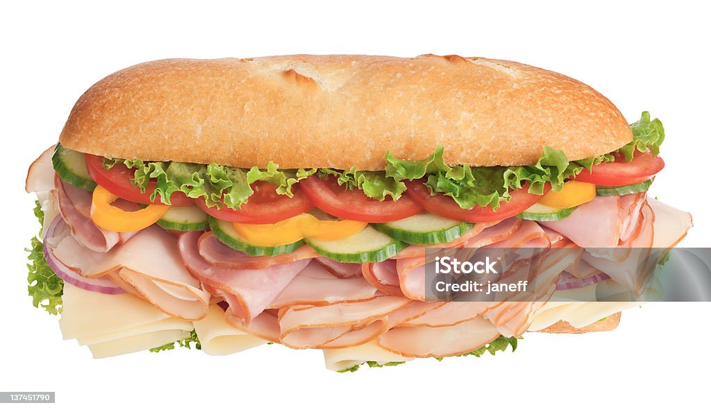 Pyszne kanapki Faszerowany z veggies mięsa, sera i deli - Zbiór zdjęć royalty-free (Sandwich z bagietki)