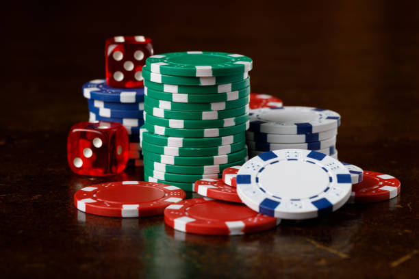 istock Group of gambling chips and red dice 1374518602